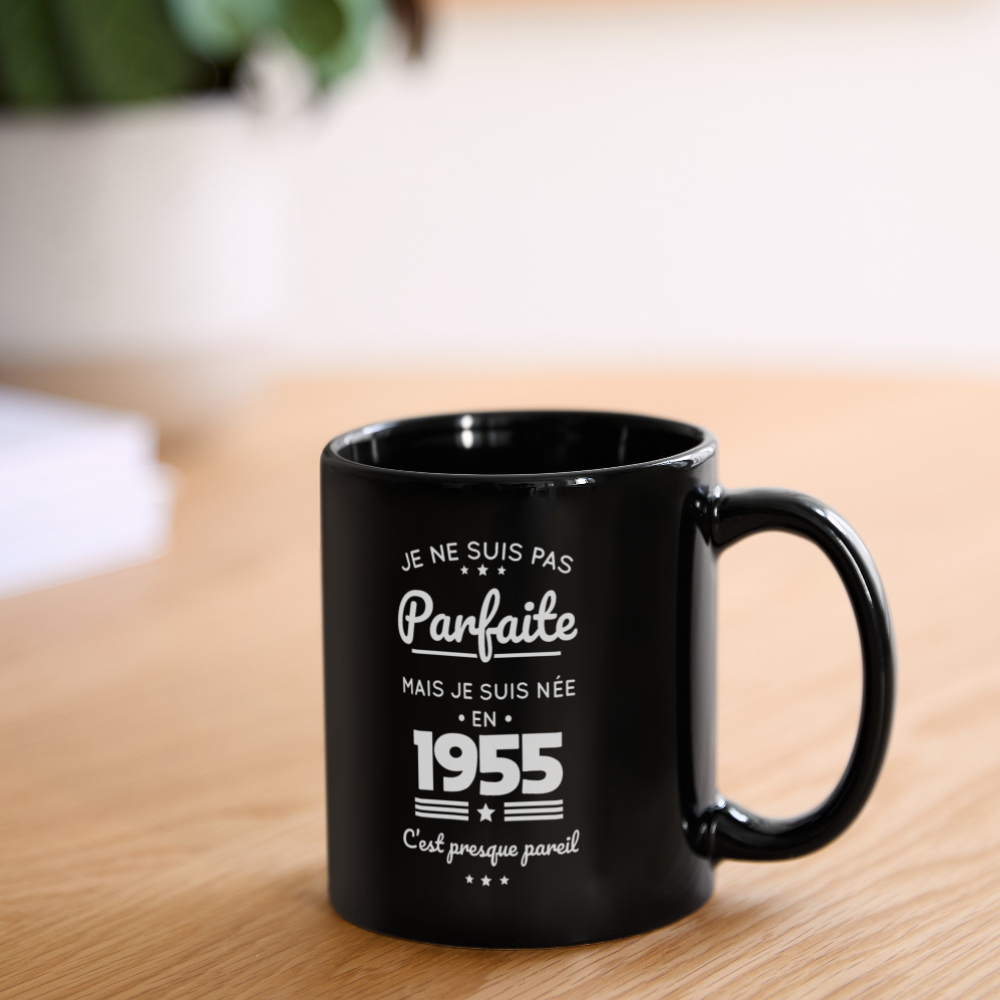 Mug uni - Anniversaire 70 Ans - Pas parfaite mais née en 1955 - noir