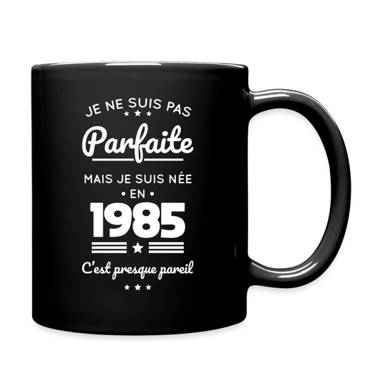 Mug uni - Anniversaire 40 Ans - Pas parfaite mais née en 1985 - noir